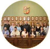 Group of EU4Youth participants gathered inside an official meeting room during a study visit to Poland focused on youth leadership and civic engagement.