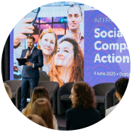 Speaker presenting at an EU4Youth international conference in Chișinău on youth-led social enterprises, with participants attending the event.